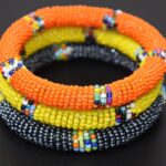 Tembo Crafts Africa – Set of 3 Handmade Bangles for Women Maasai Beaded Bracelets Boho Jewelry Gifts Orange Metallic Grey Yellow Handmade From Africa