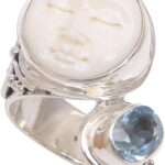 NOVICA Artisan Handmade Blue Topaz Cocktail Ring Bone Face from Bali .925 Sterling Silver Indonesia Birthstone Gemstone ‘Sparkling Face’