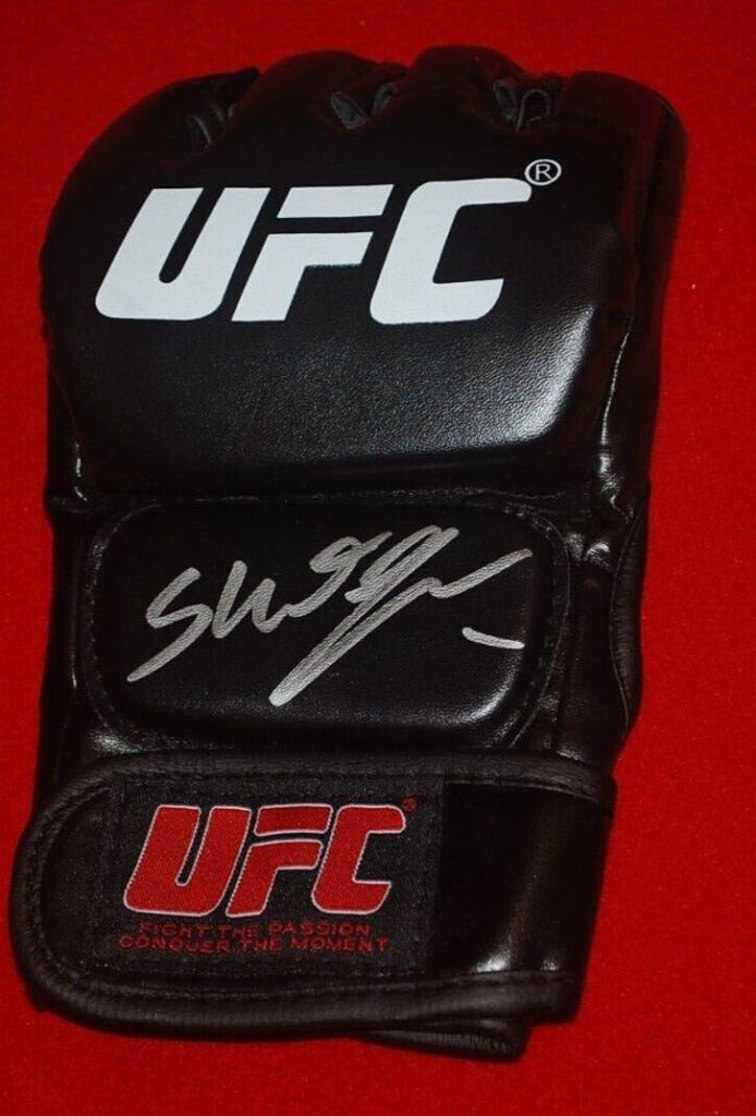 MAURICIO RUA SHOGUN UFC MMA Signed Glove Beckett Witnessed COA W631652 – Autographed UFC Gloves