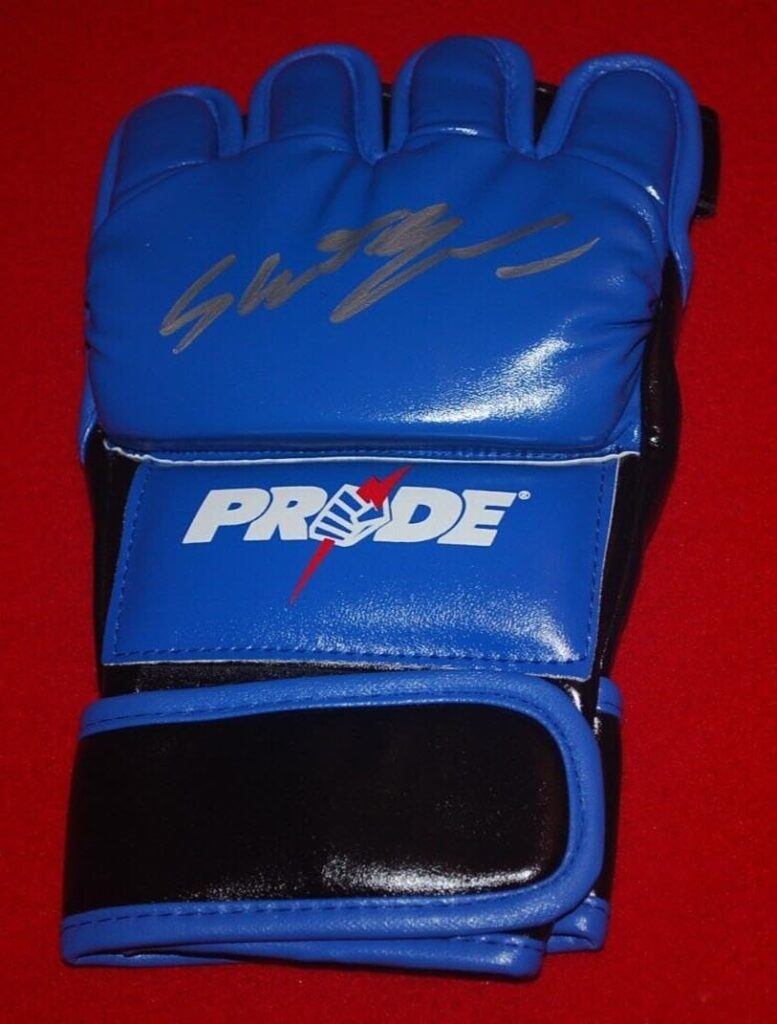 MAURICIO RUA SHOGUN PRIDE MMA Signed Glove Beckett Witnessed COA W796960 – Autographed UFC Gloves