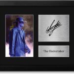 HWC Trading The Undertaker Gifts USL Framed Printed Signed Autograph Picture for WWE & WWF Memorabilia Fans – US Letter Size