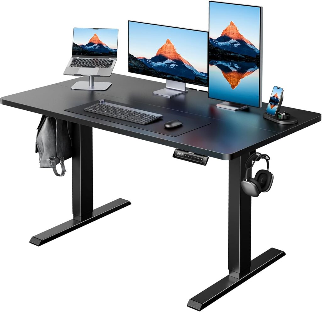 HUANUO 48″ x 24″ Electric Standing Desk Adjustable Height, 4 Memory Height Settings, Headphone Hook, Cable Manager, Sit Stand Up Desk for Home Office & Computer Workstation, Black
