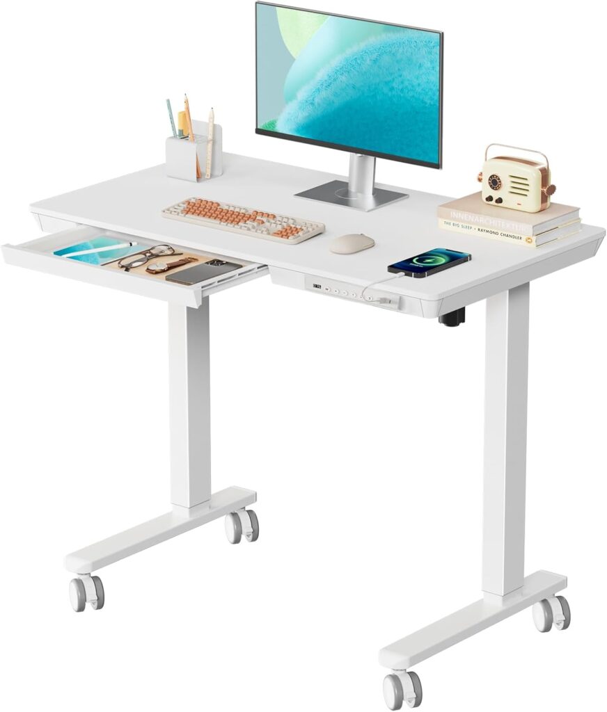 Small Standing Desk with Drawer, 35″ x 20″ Whole Piece Tabletop Electric Sit Stand Desk, Height Adjustable Desk with Storage & USB Ports, Quick Install Home Office Computer Desk, White