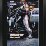 HWC Trading RoboCop The Cast Peter Weller and Nancy Allen 16 x 12 inch Framed Gifts Printed Poster Signed Autograph Picture for Movie Memorabilia Fans – 16″ x 12″ Framed