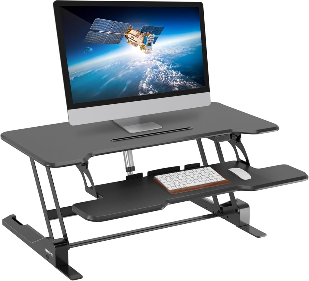 Mount-It! Electric Standing Desk Converter with 38″ Tabletop, Height Adjustable Sit Stand Desk Riser, Motorized Desk Riser with Keyboard Tray and Device Slot, Fits Monitor & Laptop, Black