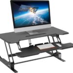 Mount-It! Electric Standing Desk Converter with 38″ Tabletop, Height Adjustable Sit Stand Desk Riser, Motorized Desk Riser with Keyboard Tray and Device Slot, Fits Monitor & Laptop, Black
