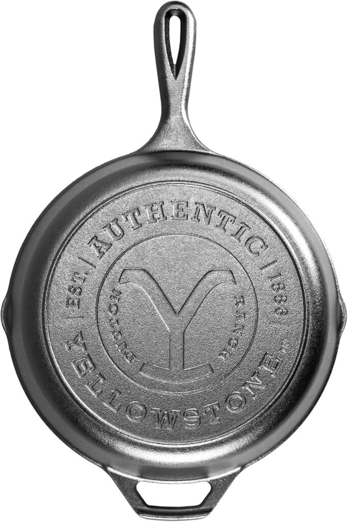 Lodge Pre-Seasoned Yellowstone Stamped Cast Iron Cookware – Signature Teardrop Handle – Use in the Oven, on the Stove, on the Grill, or Over a Campfire – 10.25 Inch Logo Skillet