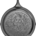 Lodge 13.25 Inch Dolly Parton Pre-Seasoned Cast Iron Stamped Skillet – Signature Teardrop Handle – Use in the Oven, on the Stove, on the Grill, or Over a Campfire – Clear Blue Morning
