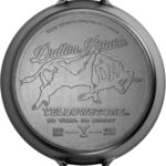 Lodge Pre-Seasoned Yellowstone Stamped Cast Iron Cookware – Signature Teardrop Handle – Use in the Oven, on the Stove, on the Grill, or Over a Campfire – 17 Inch Logo Skillet